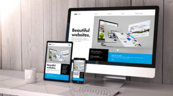 Digital generated devices on desktop, responsive cool website builder design on screen. All screen graphics are made up. 3d rendering.